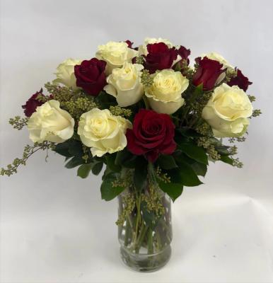 12 white rosrs, 12 red roses, seeded eucalyptus in glass vase arrangement