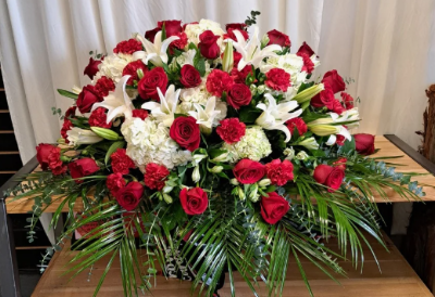 24–30 red roses,6–8 white lilies,12–15 red carnations, 4–6 large white hydrangea casket spray 