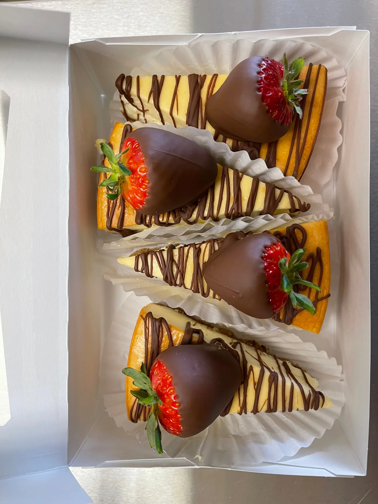 Chocolate drizzled cheesecake with chocolate dipped strawberry – photo 2